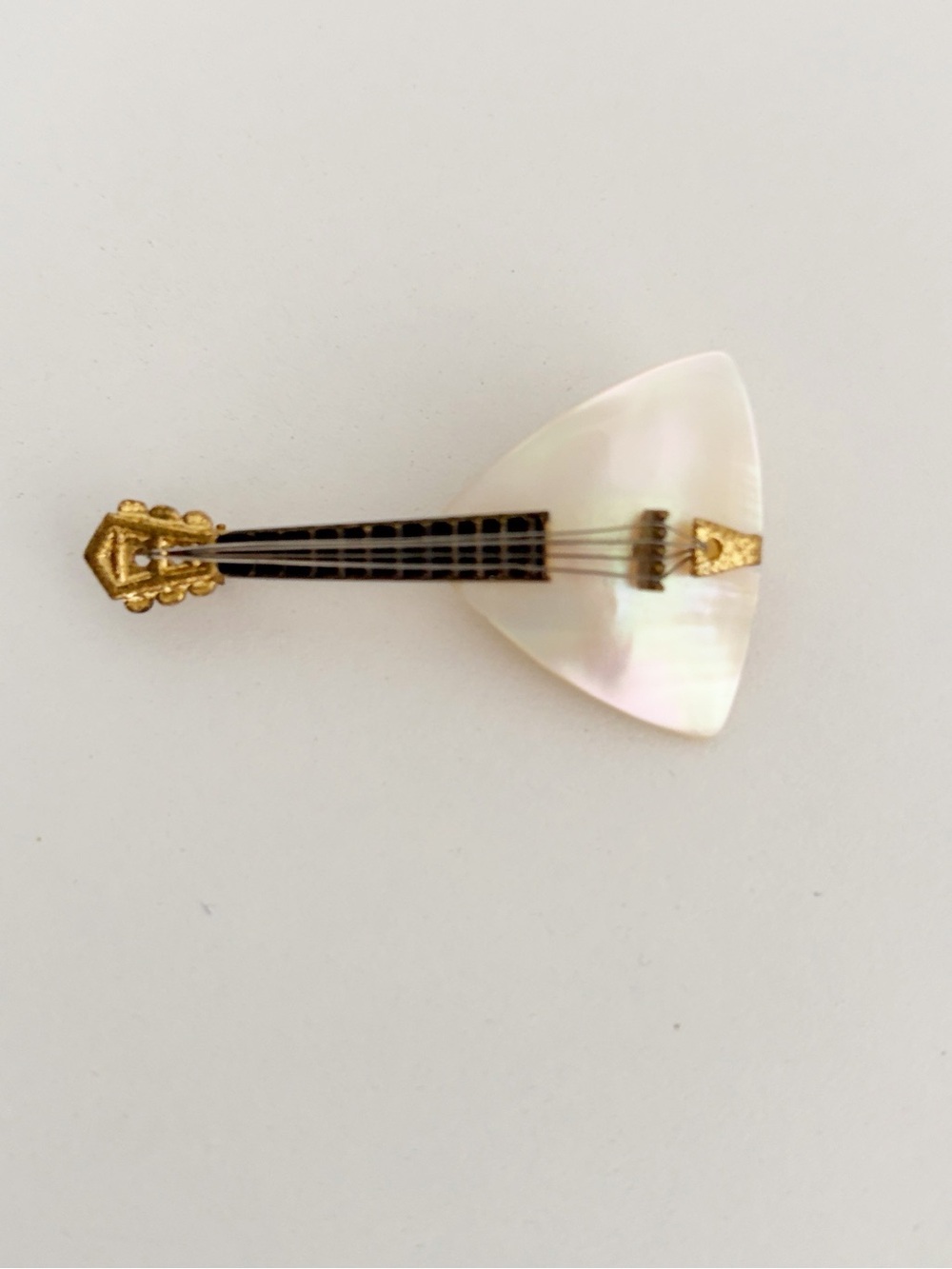 Vintage West Germany gold tone mother of pearl instrument guitar brooch pin